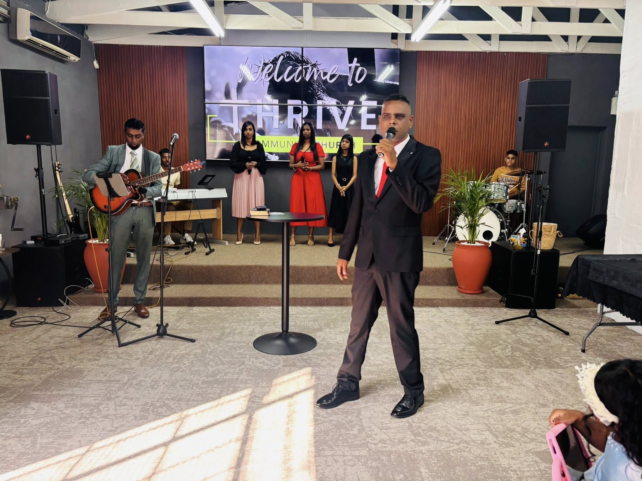 Worship team leading praise Thrive Community Church